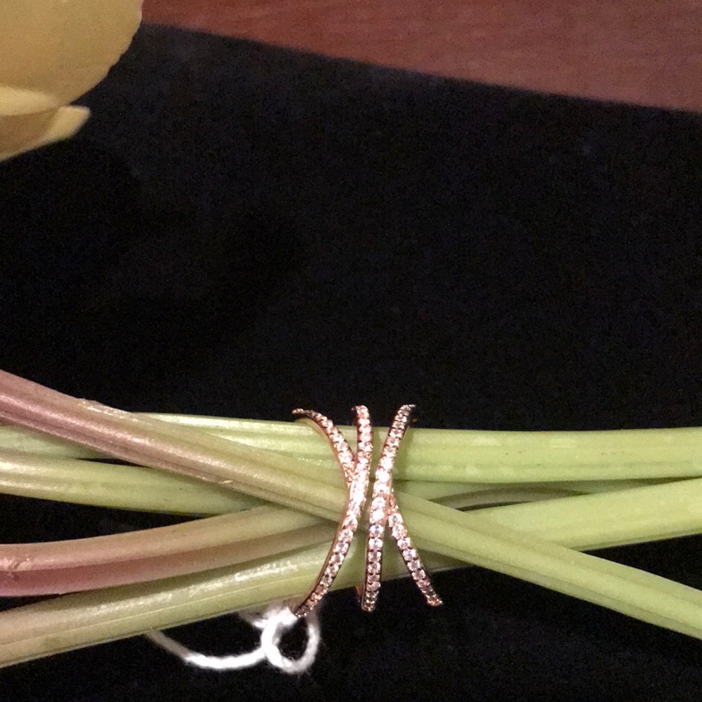 Crisscrossing rose gold ring